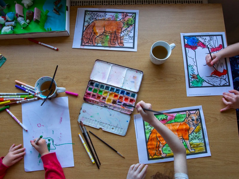 Home-Start volunteer with child making pastry