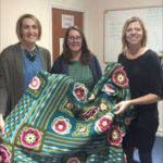 Blanket photo. Rachael Brodie, Home-Start IOW Family Support Worker set herself a challenge to learn to crochet. This beautiful blanket was the result of her efforts!